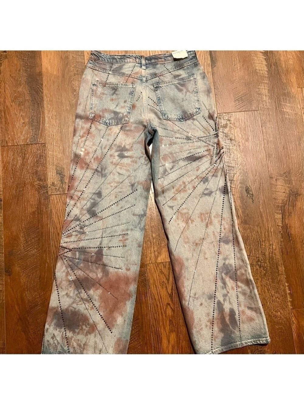 WE THE FREE Aurora mid rise studded star pattern tie dye jeans. Size 27. NWT